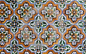 Moorish style ceramic tiles with geometrical flower patterns from Seville photo